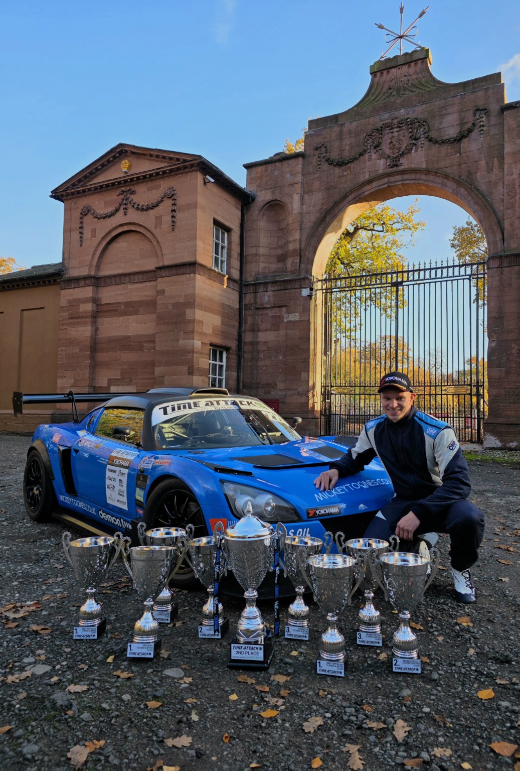 Dean Riley with trophies and the VX220